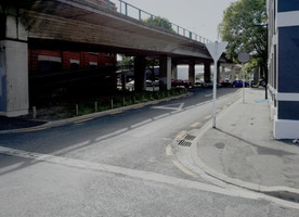 Photograph showing Jetty Street in its previous form, looking east from Vogel Street.