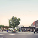 Looking west across Ponsonby Road into the site showing existing buildings retained/adapted to the street edge and green park spaces beyond_