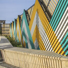 Woven tukutuku inspired fence design. Timber with steel supports and framing.