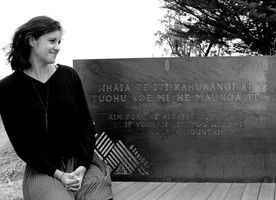 Daughter Ana Heremaia on the memorial seat.