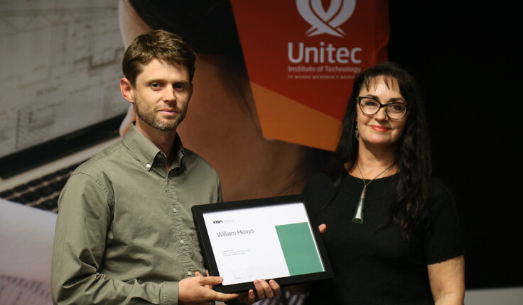 William Heays being presented NZILA/Frank Boffa Award Supreme Award for overall excellence by Debbie Tikao.