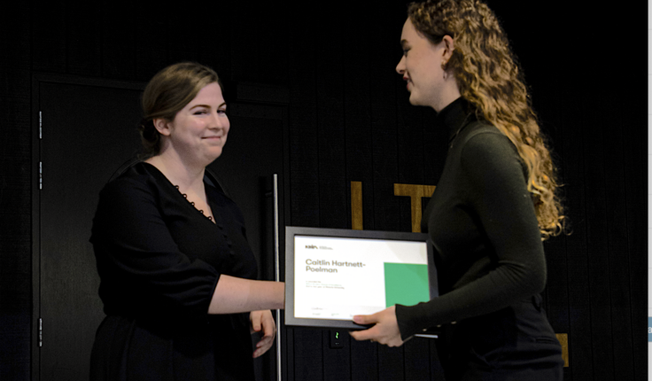 Cassandra Drayton presents Caitlin Hartnett-Poelman with the NZILA Award of Excellence as the top student in the 2nd to last year for the 2022 academic year.