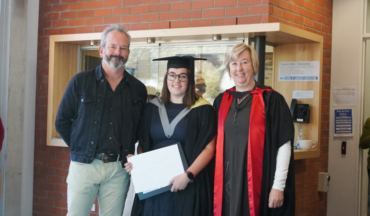 Nicole Tune being presented the NZILA/Robin Gay Award by Matt Lester with Gillian Lawson.