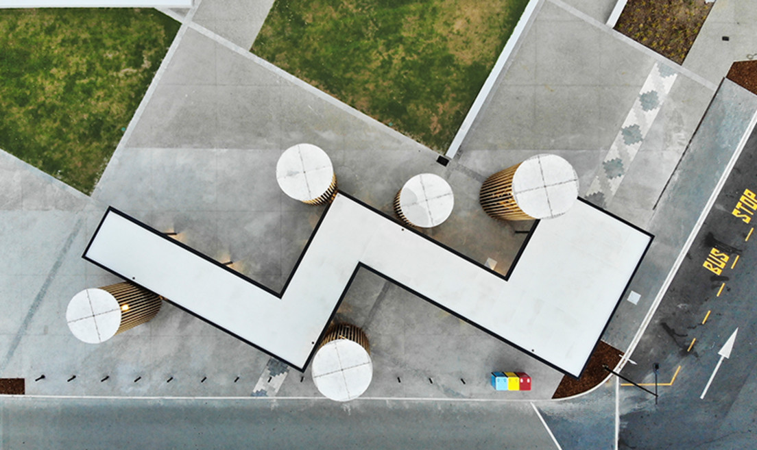 The design has strong geometric forms, complemented within the landscape.