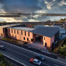 Aerial evening view across School to Te Ihutai estuary, Frank Visser Photography (2020)