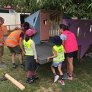 Tamariki assemble the Imaginarium along with their whānau and caregivers.