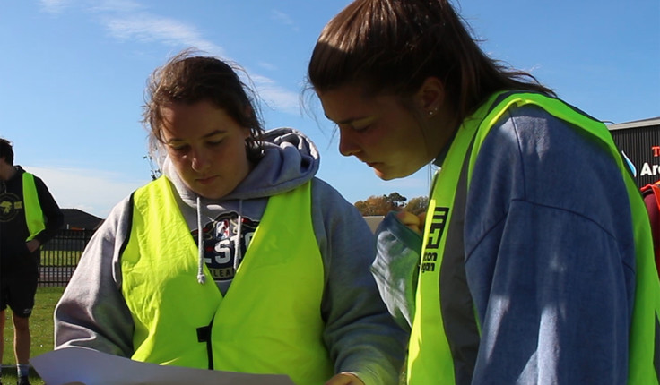 Nicole Tune (left) working with classmates at Ararira Springs Primary School.